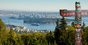 Vancouver as seen from view point. First nation totem pole in Vancouver.
